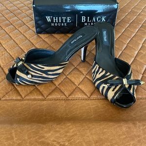 White House Black Market tiger print slides.